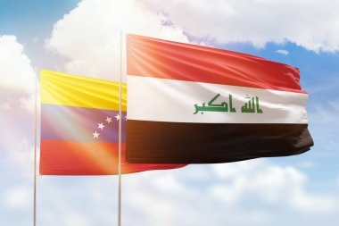 Sunny blue sky and flags of iraq and venezuela
