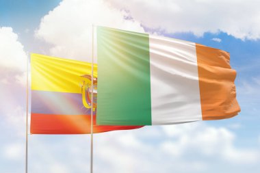 Sunny blue sky and flags of ireland and ecuador