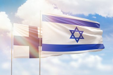 Sunny blue sky and flags of israel and finland