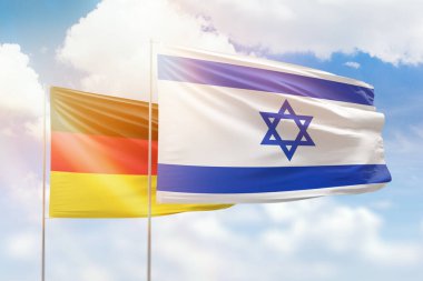 Sunny blue sky and flags of israel and germany