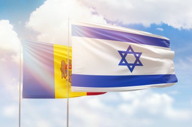 Sunny blue sky and flags of israel and moldova