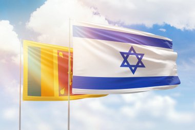 Sunny blue sky and flags of israel and sri lanka
