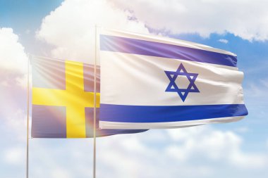 Sunny blue sky and flags of israel and sweden