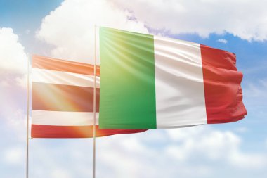 Sunny blue sky and flags of italy and thailand