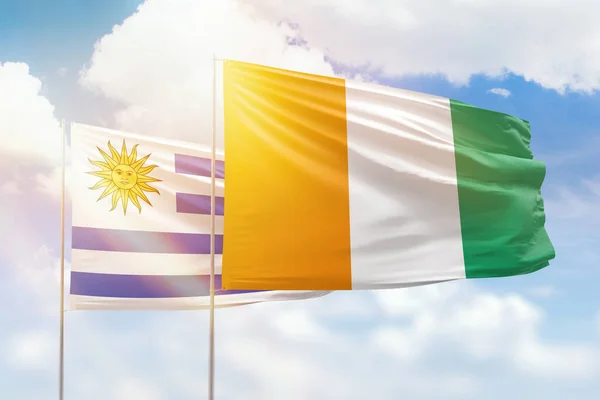 Sunny Blue Sky Flags Ivory Coast Uruguay — Stock Photo, Image