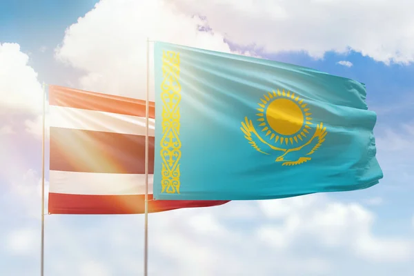 Γαλάζιος Ουρανός Και Σημαίες Του Καζαχστάν Και Της Ταϊλάνδης — Φωτογραφία Αρχείου