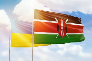 Sunny blue sky and flags of kenya and ukraine