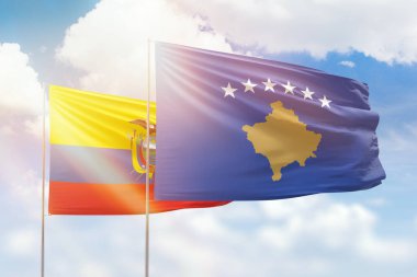 Sunny blue sky and flags of kosovo and ecuador