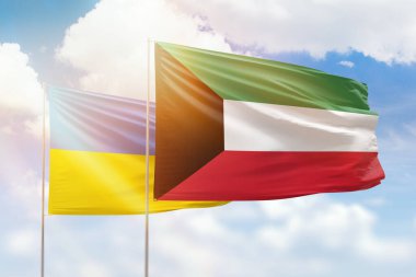 Sunny blue sky and flags of kuwait and ukraine