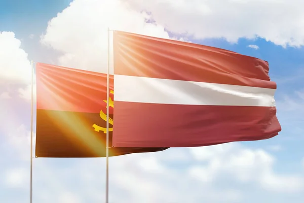 Sunny Blue Sky Flags Latvia Angola — Stock fotografie