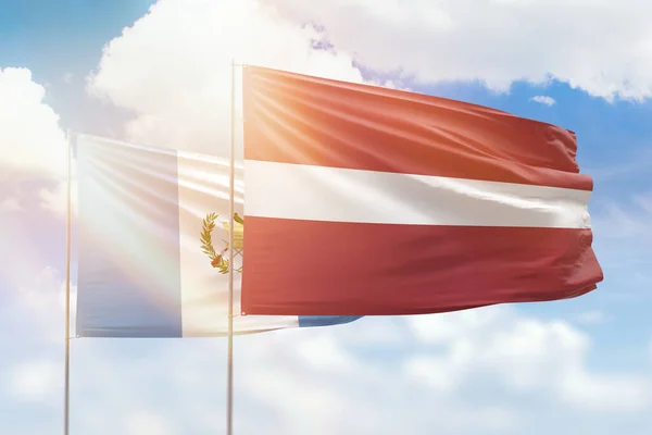 Sunny Blue Sky Flags Latvia Guatemala — 스톡 사진