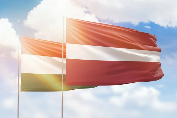 Sunny Blue Sky Flags Latvia Hungary — Stockfoto