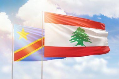 Sunny blue sky and flags of lebanon and dr congo