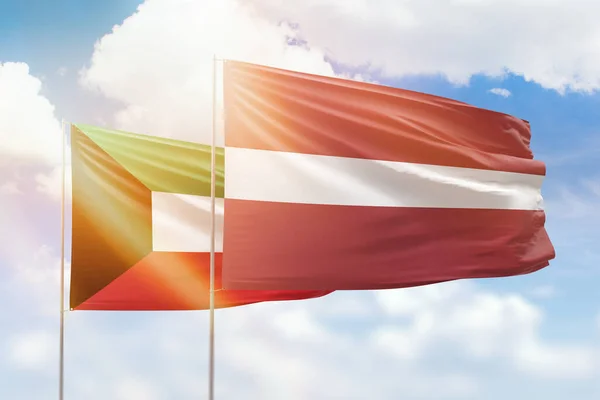 Sunny Blue Sky Flags Latvia Kuwait — Stock fotografie