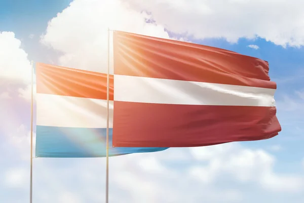 Sunny Blue Sky Flags Latvia Luxembourg — Foto Stock