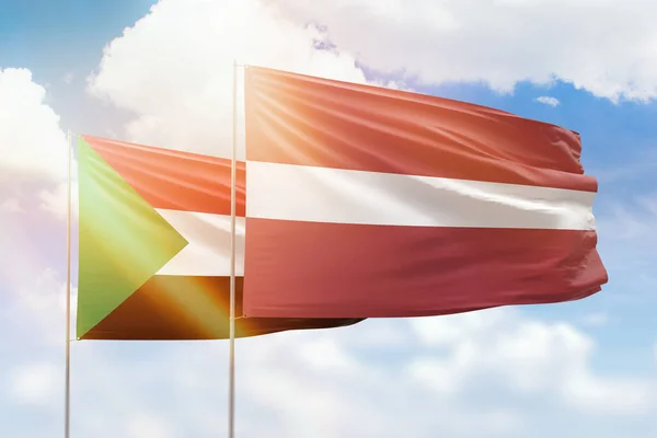 Sunny Blue Sky Flags Latvia Sudan — Stok fotoğraf