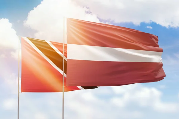 Sunny Blue Sky Flags Latvia Trinidad Tobago — Stok fotoğraf