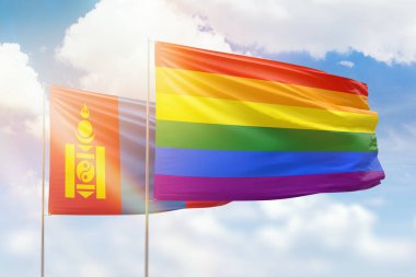 Sunny blue sky and flags of lgbt and mongolia