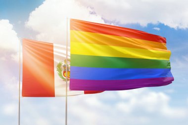 Sunny blue sky and flags of lgbt and peru