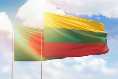 Sunny blue sky and flags of lithuania and bangladesh