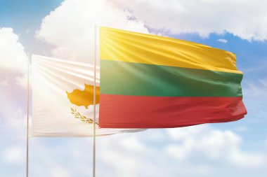 Sunny blue sky and flags of lithuania and cyprus