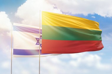 Sunny blue sky and flags of lithuania and israel
