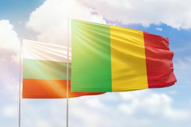 Sunny blue sky and flags of mali and bulgaria