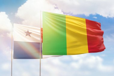 Sunny blue sky and flags of mali and panama