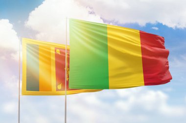 Sunny blue sky and flags of mali and sri lanka