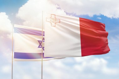 Sunny blue sky and flags of malta and israel