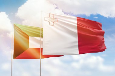 Sunny blue sky and flags of malta and kuwait