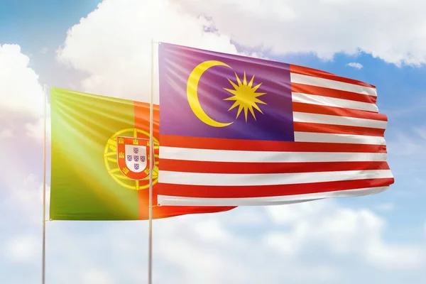 Sunny Blue Sky Flags Malaysia Portugal — Stock Photo, Image