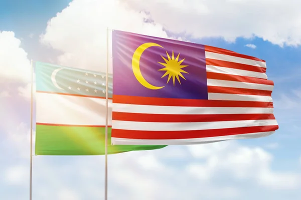 Sunny Blue Sky Flags Malaysia Uzbekistan — Stock Photo, Image