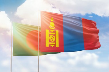 Sunny blue sky and flags of mongolia and bangladesh