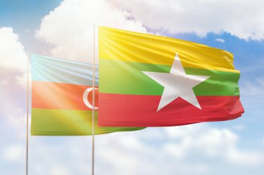 Sunny blue sky and flags of myanmar and azerbaijan