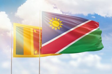 Sunny blue sky and flags of namibia and sri lanka