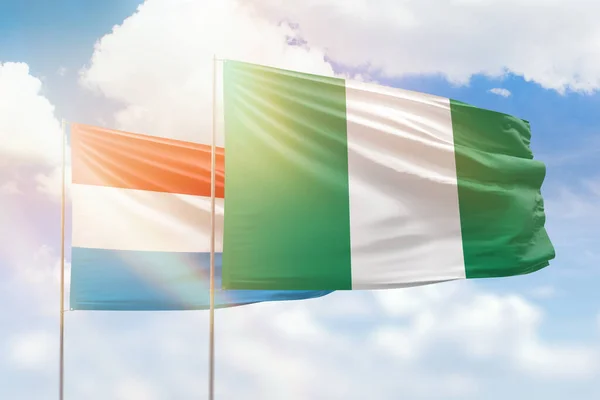 Sunny Blue Sky Flags Nigeria Luxembourg — Stockfoto