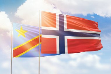 Sunny blue sky and flags of norway and dr congo