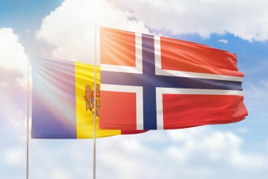Sunny blue sky and flags of norway and moldova