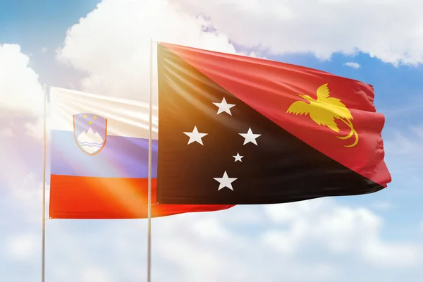 Sunny Blue Sky Flags Papua New Guinea Slovenia — Stockfoto