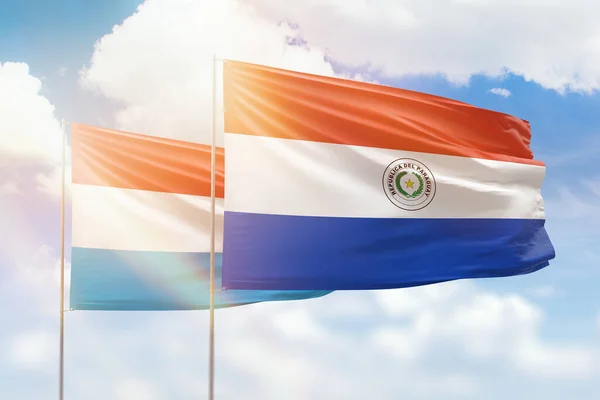 Sunny Blue Sky Flags Paraguay Luxembourg — Stockfoto