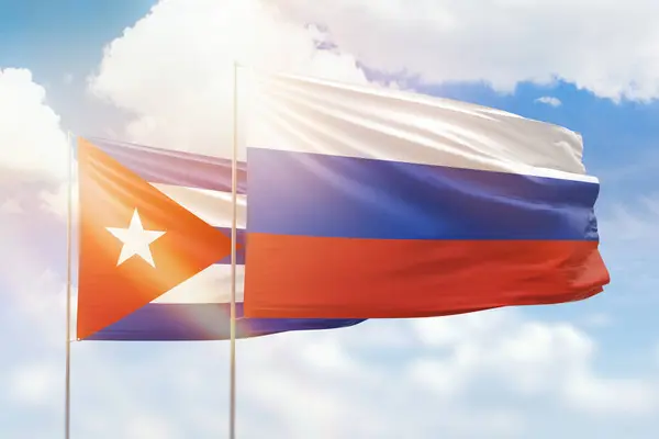 Sunny Blue Sky Flags Russia Cuba — Stock Photo, Image