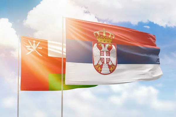 Sunny Blue Sky Flags Serbia Oman — Fotografia de Stock