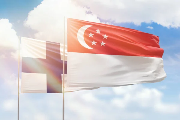 Sunny Blue Sky Flags Singapore Finland — Stock fotografie