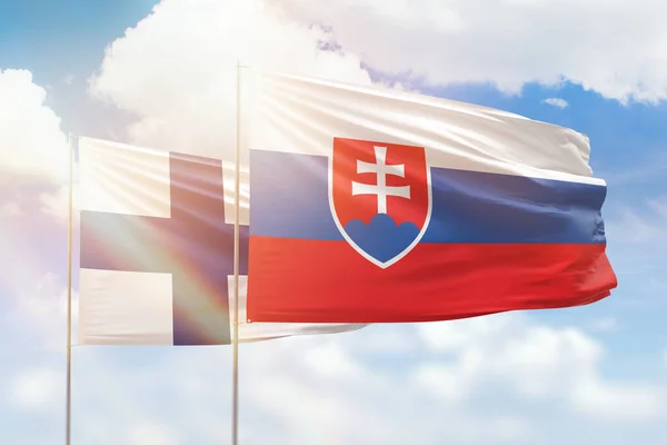 Sunny Blue Sky Flags Slovakia Finland —  Fotos de Stock