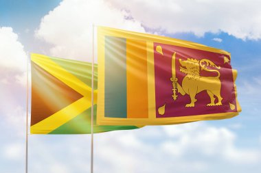 Sunny blue sky and flags of sri lanka and jamaica