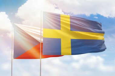 Sunny blue sky and flags of sweden and czechia
