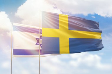 Sunny blue sky and flags of sweden and israel