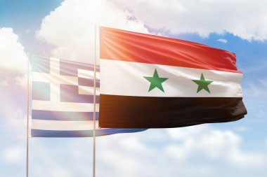 Sunny blue sky and flags of syria and greece