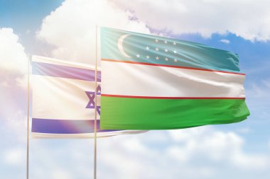 Sunny blue sky and flags of uzbekistan and israel